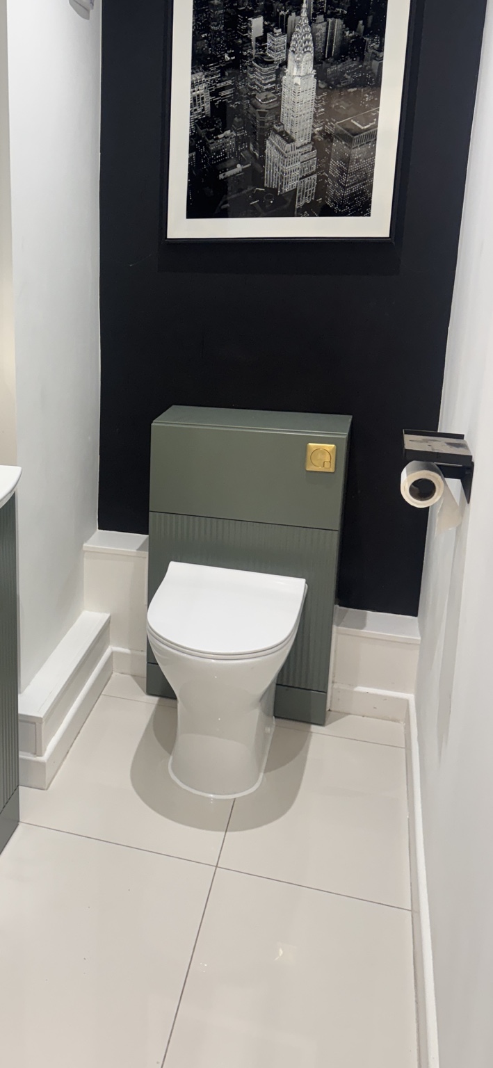 New concealed cistern toilet fitted into modified boxing in a Chelmsford cloakroom