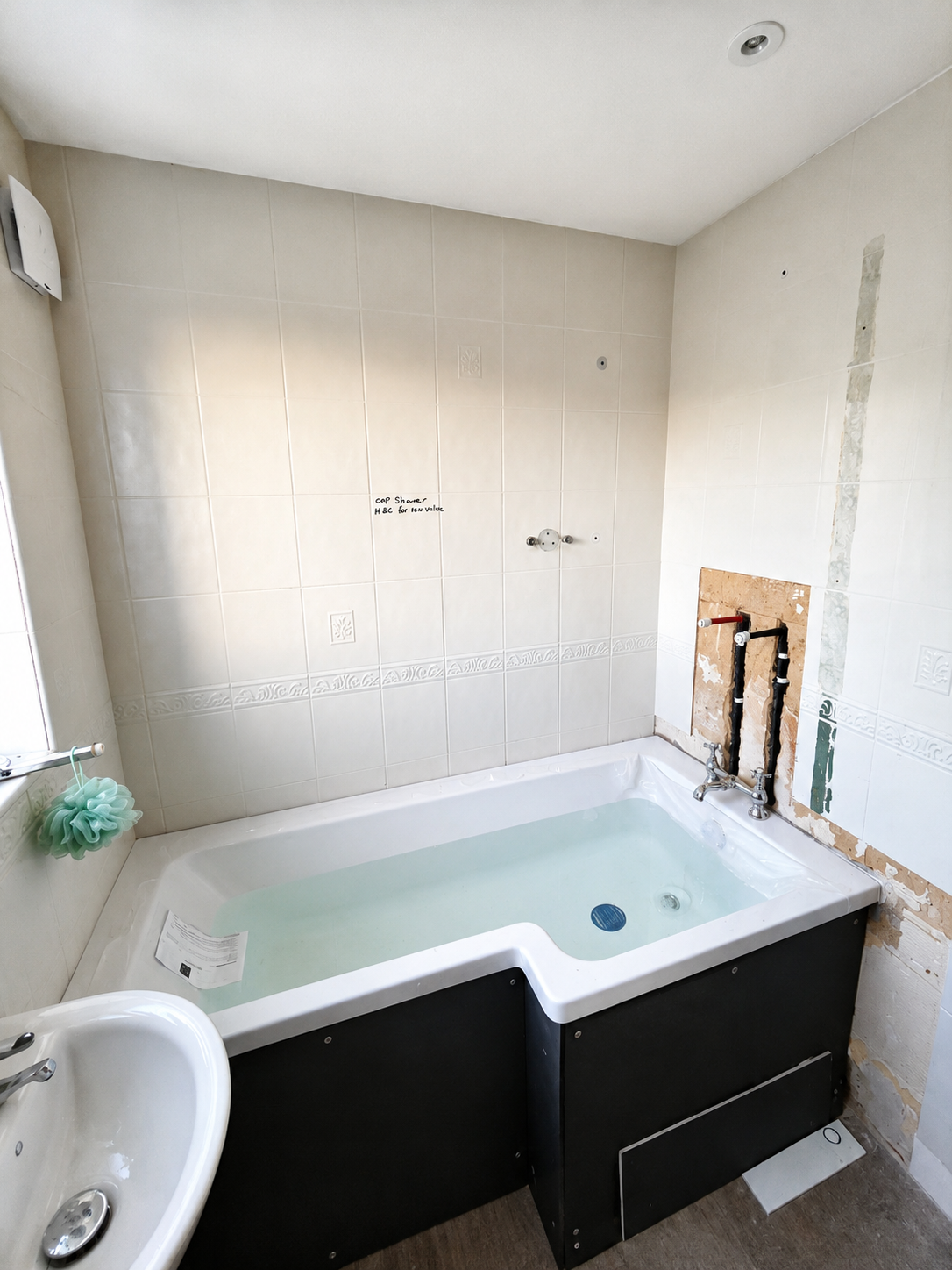 New bath installed with first-fix pipework for an exposed thermostatic shower valve in a Basildon bathroom renovation